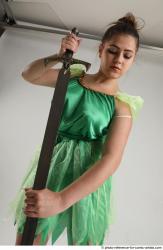 Woman Adult Average White Fighting with sword Standing poses Casual